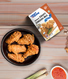 Crust N Crumb Instant Crispy Chicken Mix-Ginger Garlic, packaging with a bowl of fried chicken on a wooden surface.