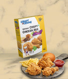 Box of Crust N Crumb Instant Crispy Chicken Mix with fried chicken, fries, and ketchup on a stone board.