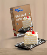 Crust & Crumb White Forest Cake Mix packaging with a slice of cake on a plate against a beige background