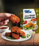 Cutlet in hands with sauce and Crust N Crumb Instant Cutlet Coating Mix in background